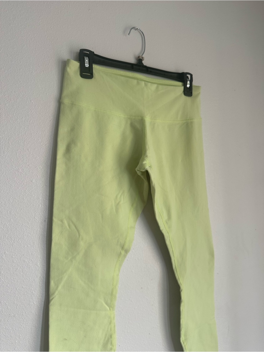 Lululemon lime green leggings with dart details. Size 8. Great condition!